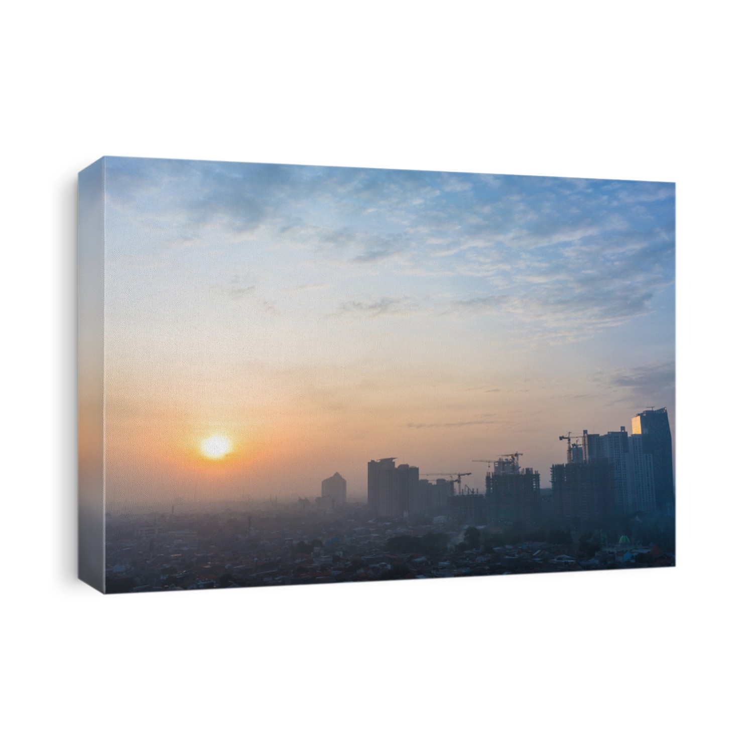 Panoramic view of Jakarta cityscape with skyscrapers and buildings under construction at sunrise